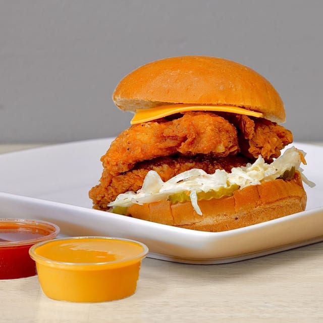 Nashville Hot Chicken Sandwich & 1 Side.